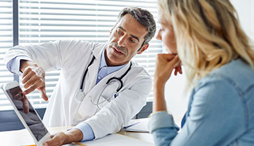provider speaking with patient in office