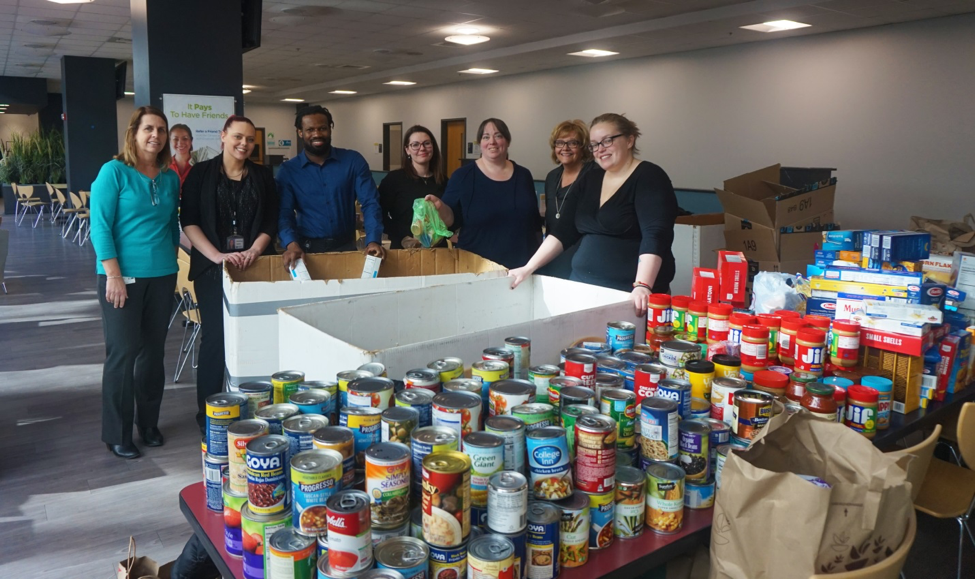 Tufts Health Plan employees organizing a food drive