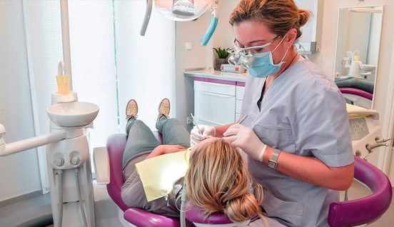 dentist with patient