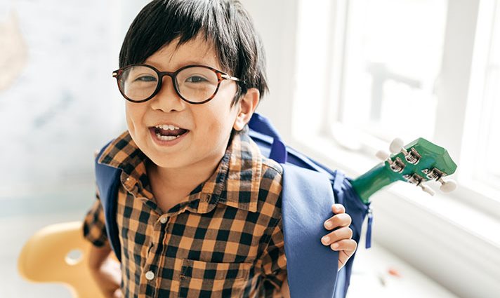 happy child wearing glasses