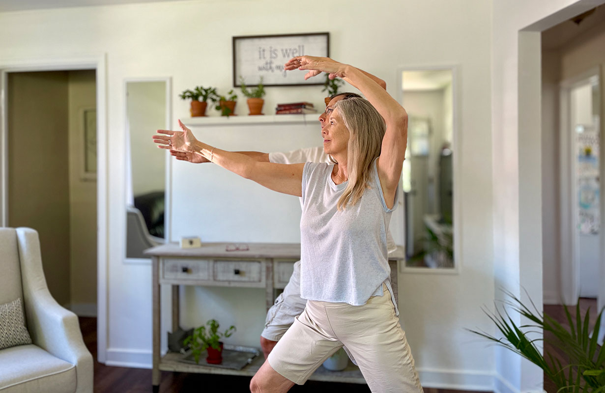 couple practicing Tai Chi at home