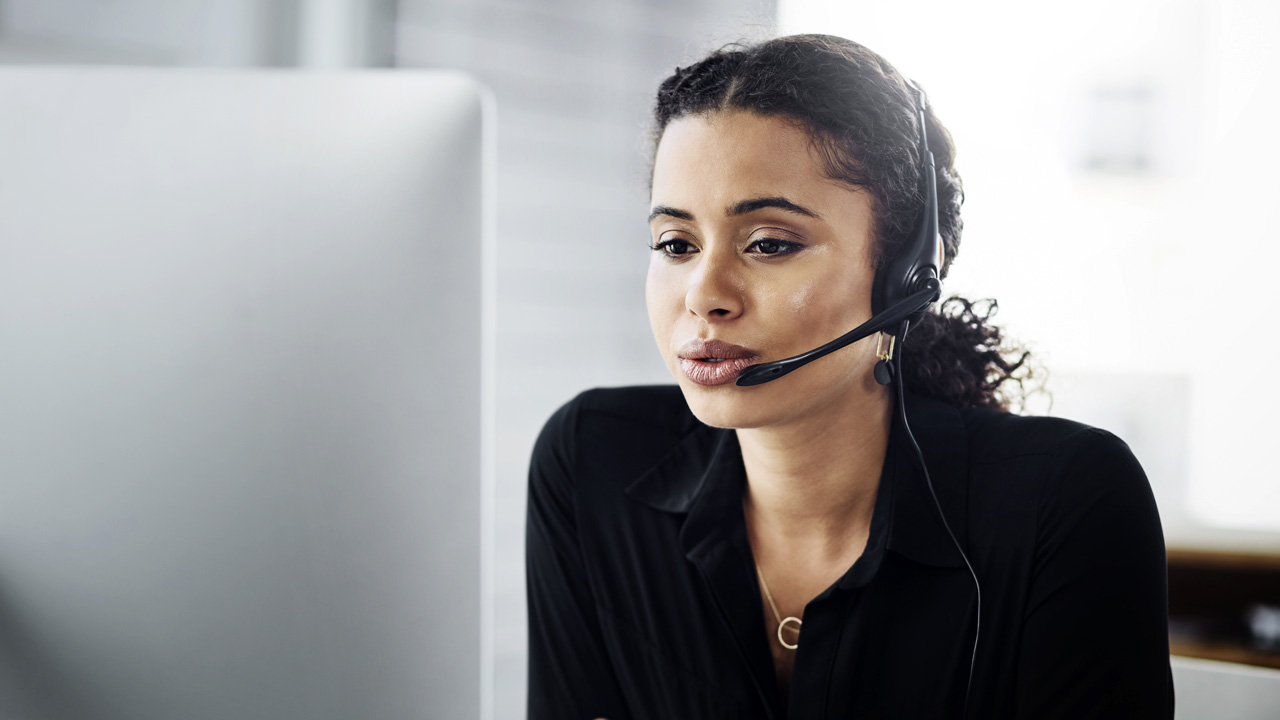 picture of an employee on a headset