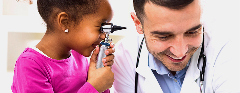 doctor letting child check his ears