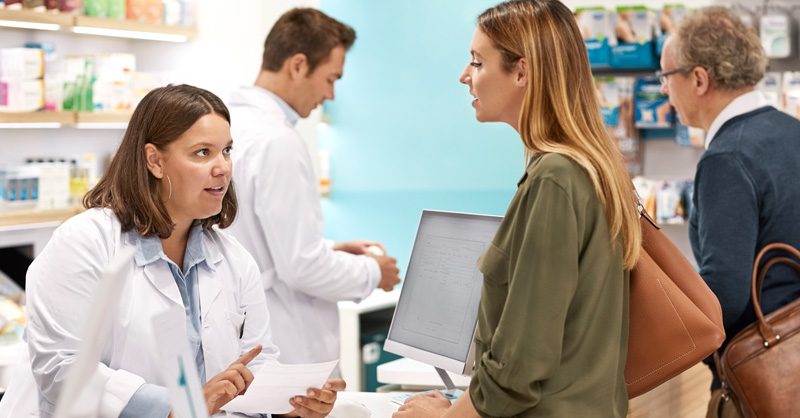 Pharmacist talking to a patient