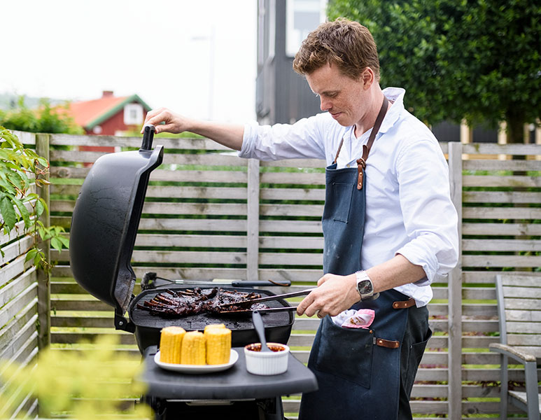 Man barbequing